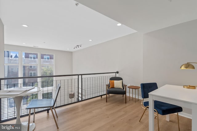 sitting room with light wood-type flooring