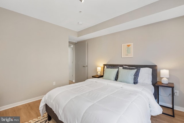 bedroom featuring light wood-type flooring