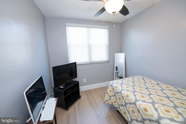 bedroom featuring ceiling fan and light hardwood / wood-style floors