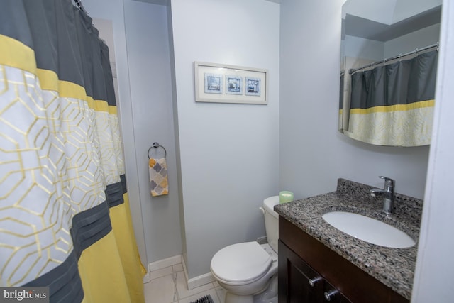 bathroom featuring tile patterned floors, vanity, toilet, and a shower with shower curtain