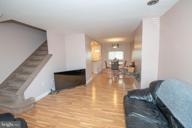 living room with light hardwood / wood-style floors