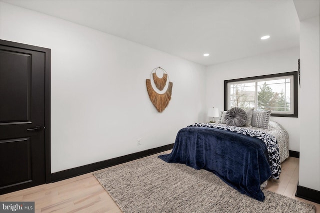 bedroom featuring light hardwood / wood-style floors