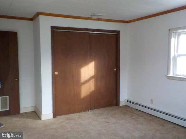 unfurnished bedroom featuring light colored carpet, crown molding, and a baseboard radiator