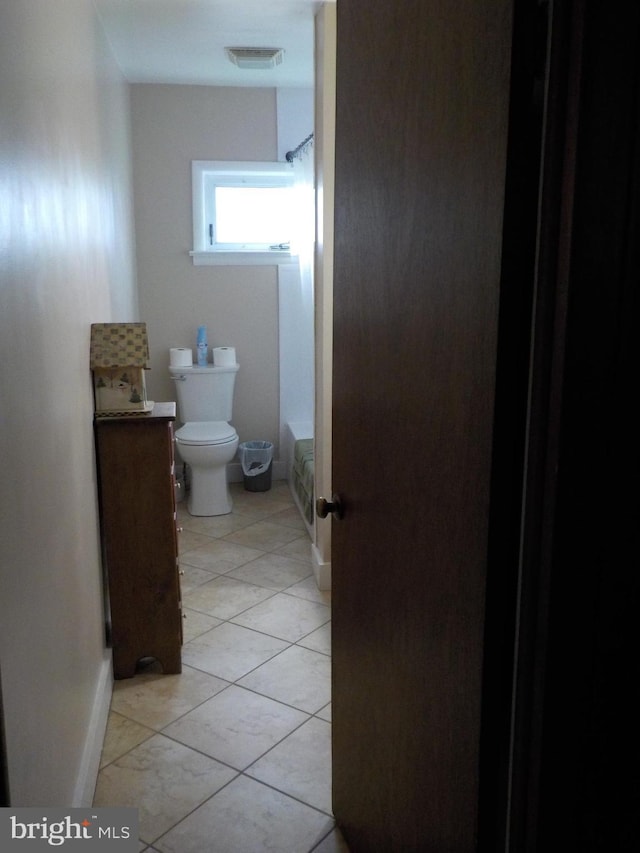 bathroom featuring toilet