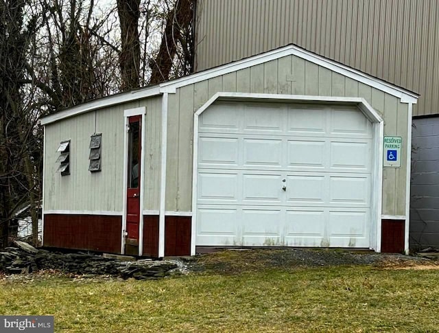 garage featuring a yard