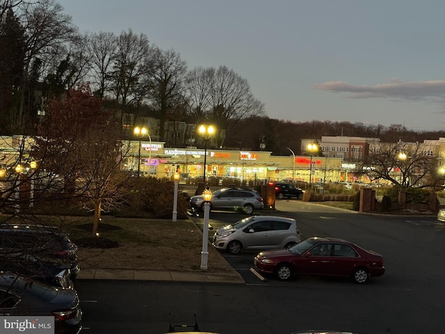 view of parking at dusk