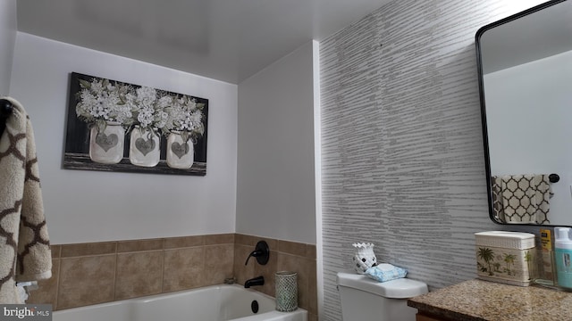 bathroom featuring a bathing tub and toilet