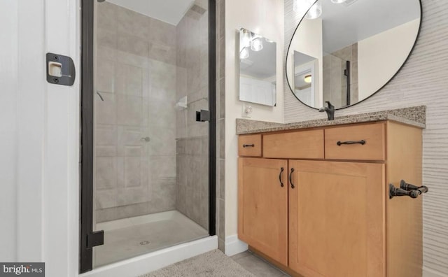 bathroom featuring vanity and walk in shower