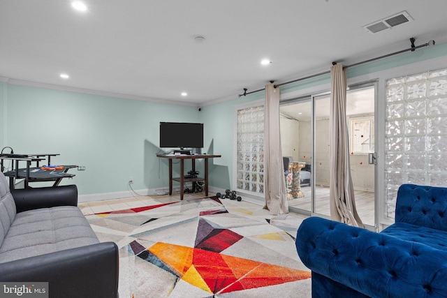 living room with ornamental molding