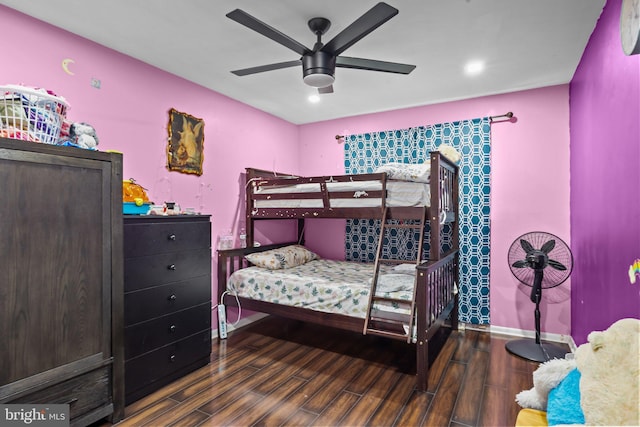 bedroom featuring dark hardwood / wood-style floors and ceiling fan