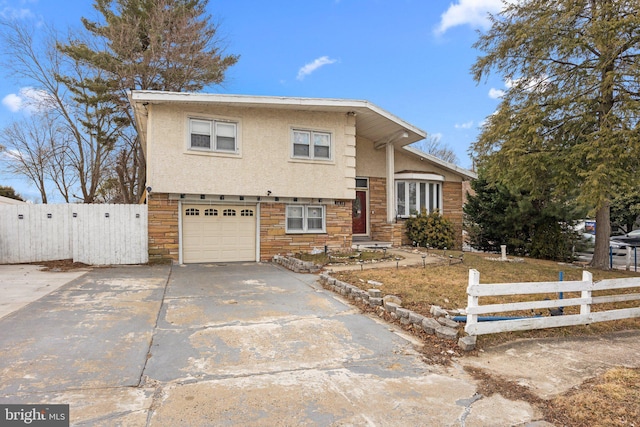 split level home with a garage