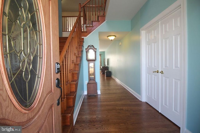 corridor featuring dark hardwood / wood-style flooring