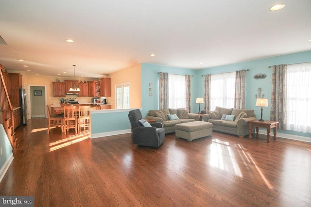 living room featuring dark wood-type flooring