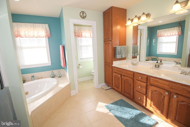 bathroom featuring tile patterned flooring, plenty of natural light, and toilet