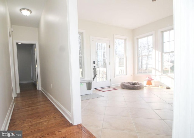 hallway with light tile patterned flooring