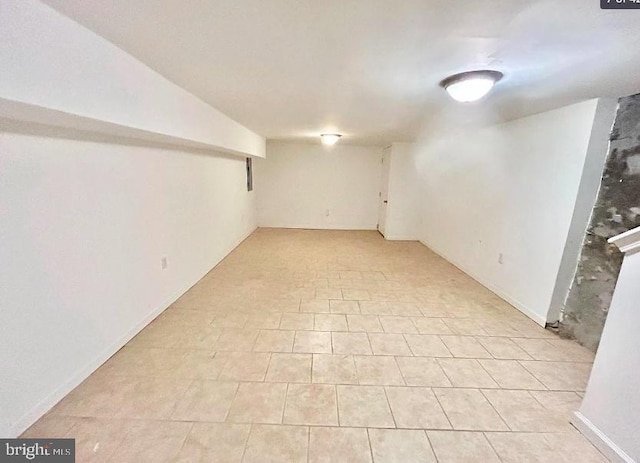 basement with light tile patterned floors