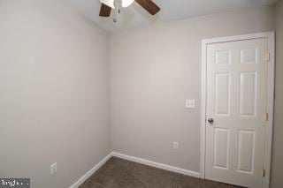 spare room with ceiling fan