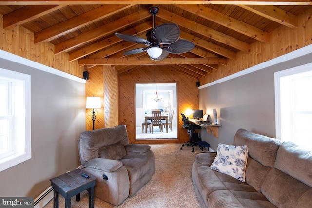 carpeted living room featuring vaulted ceiling with beams, ceiling fan with notable chandelier, wooden walls, and a baseboard heating unit