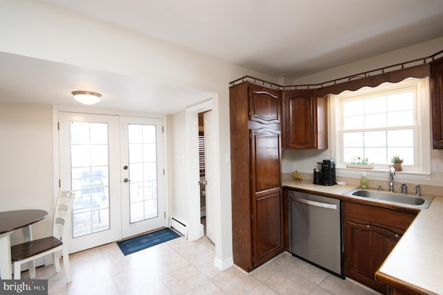 kitchen with a baseboard heating unit, french doors, sink, stainless steel dishwasher, and dark brown cabinets