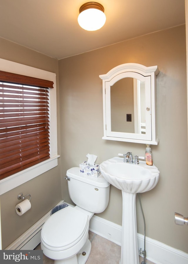 bathroom featuring toilet