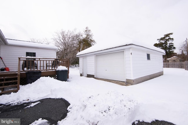 view of snow covered garage