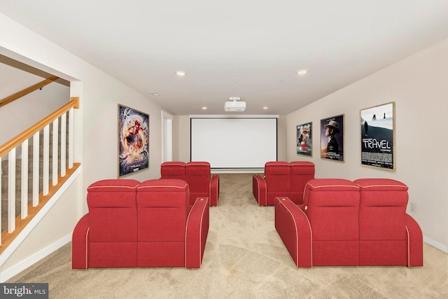 home theater room with light carpet