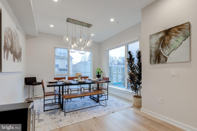 dining space featuring light hardwood / wood-style flooring