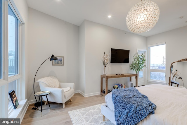 bedroom with light wood-type flooring