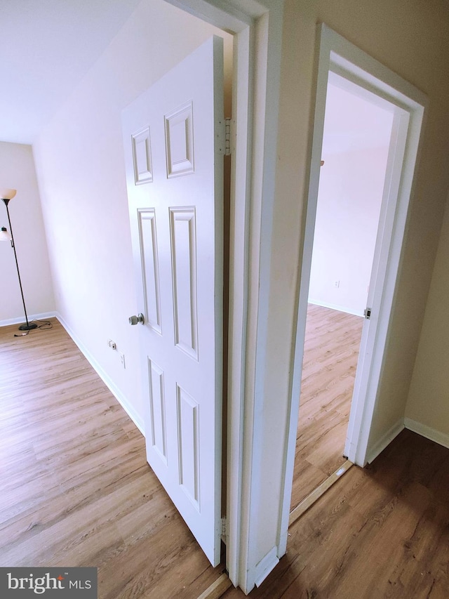 hallway featuring light hardwood / wood-style floors