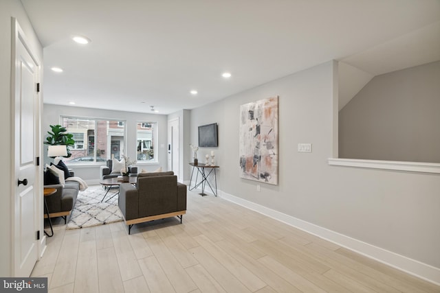 living room with light hardwood / wood-style floors