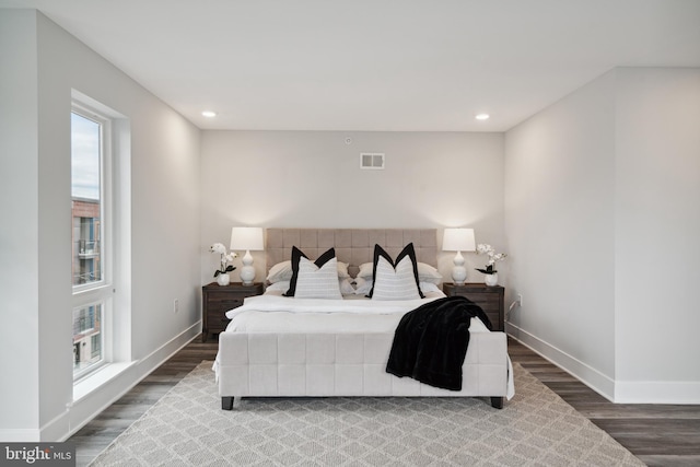 bedroom featuring wood-type flooring