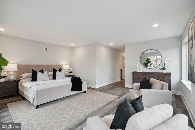 bedroom with wood-type flooring