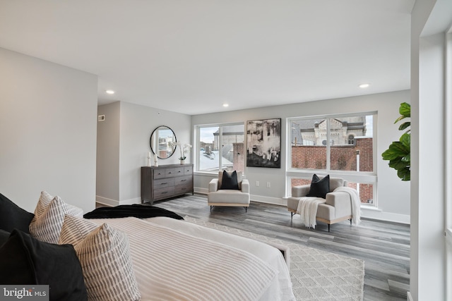 bedroom with light hardwood / wood-style flooring