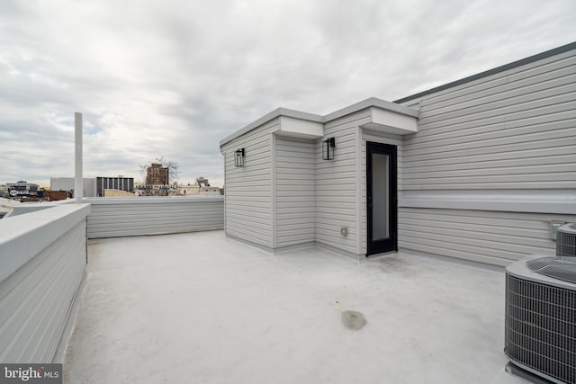 view of patio / terrace with a balcony and central AC