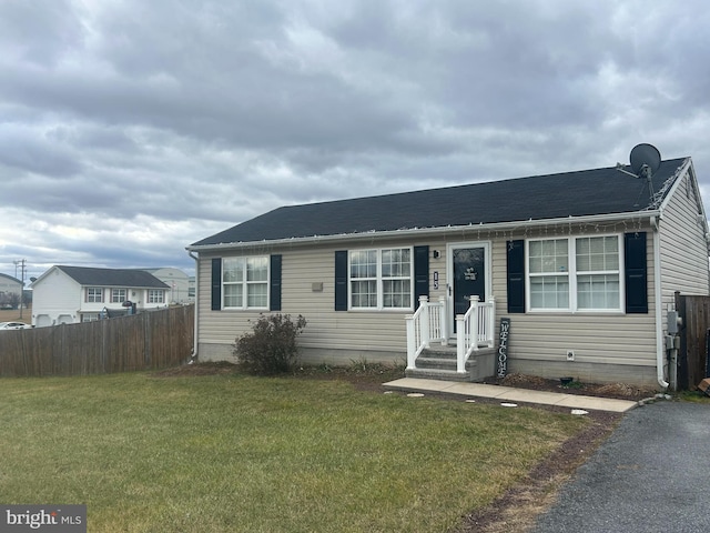 view of front of home with a front yard