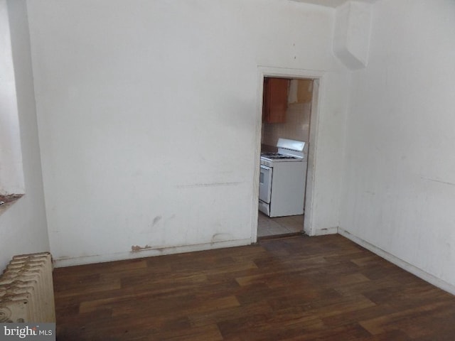 1252 N 56th St, Philadelphia, PA 19131 - spare room with radiator and wood finished floors