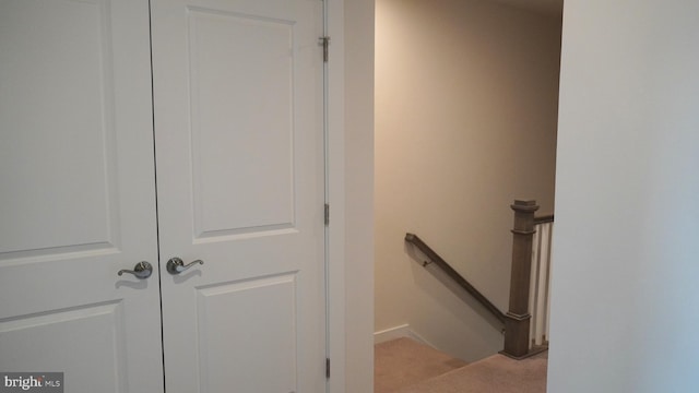 stairs featuring tile patterned floors