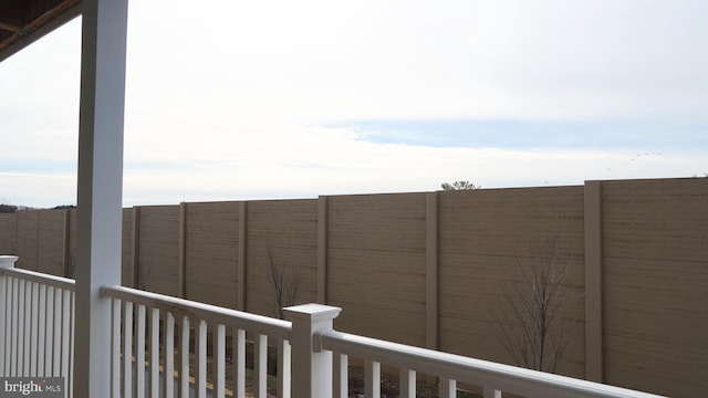 view of yard featuring a balcony