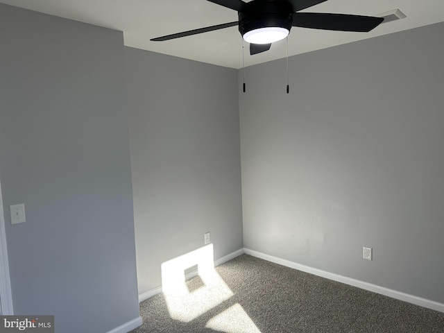 unfurnished room with carpet flooring and ceiling fan