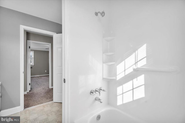 bathroom with shower / bath combination