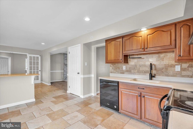 kitchen with electric range oven, decorative backsplash, sink, and black dishwasher