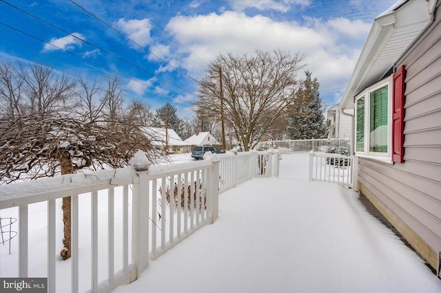 view of snow covered patio