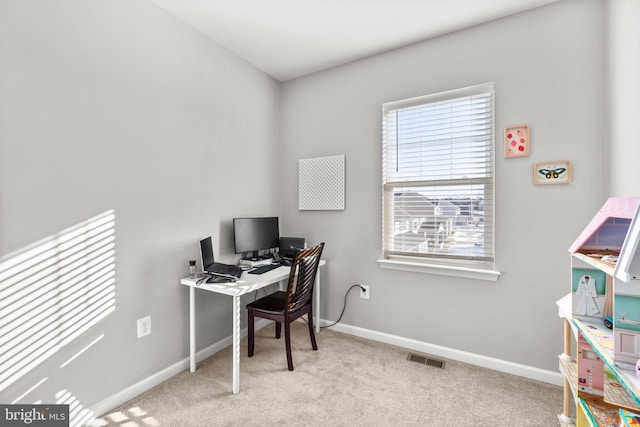 view of carpeted office space