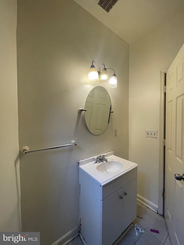 bathroom with vanity and tile patterned floors