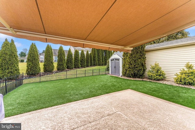 view of patio / terrace with a shed