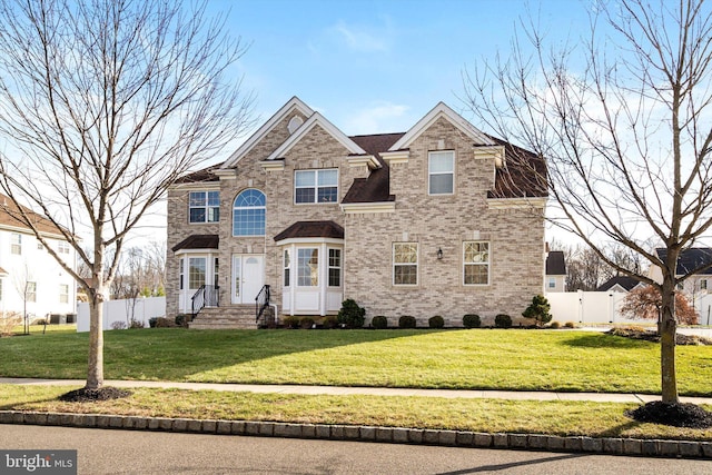 view of front of property featuring a front lawn