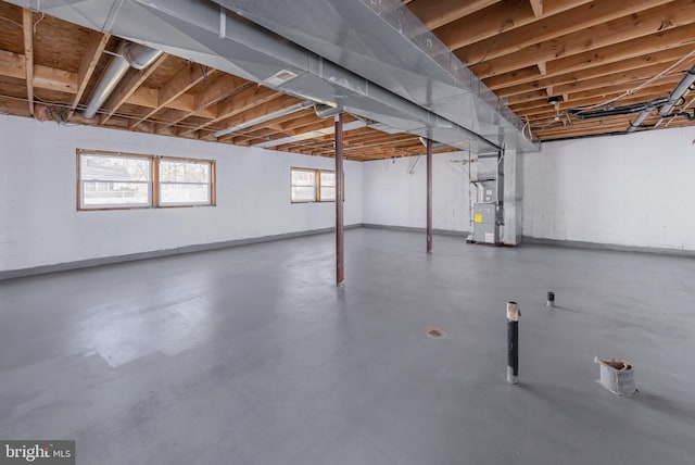 basement featuring heating unit