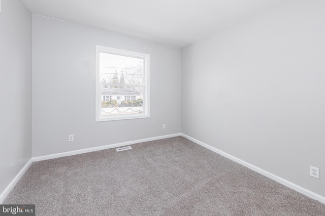 view of carpeted spare room