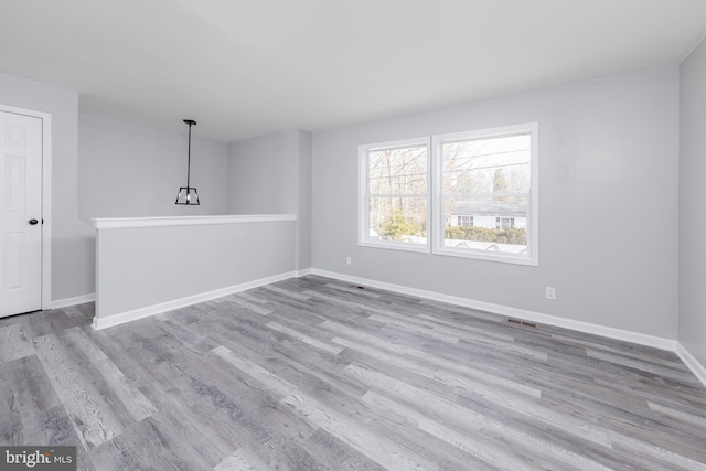 empty room featuring light wood-type flooring