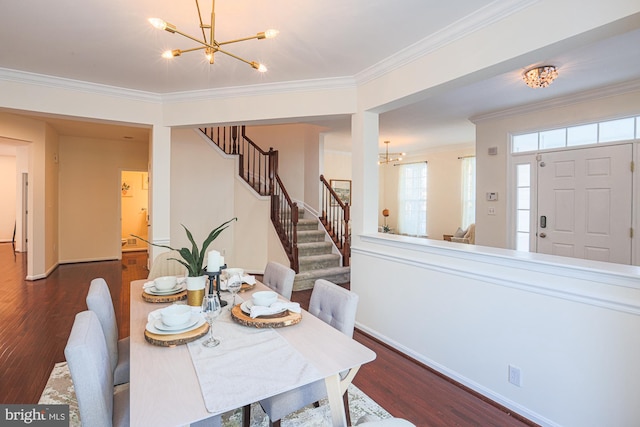 dining area featuring dark hardwood / wood-style floors and ornamental molding